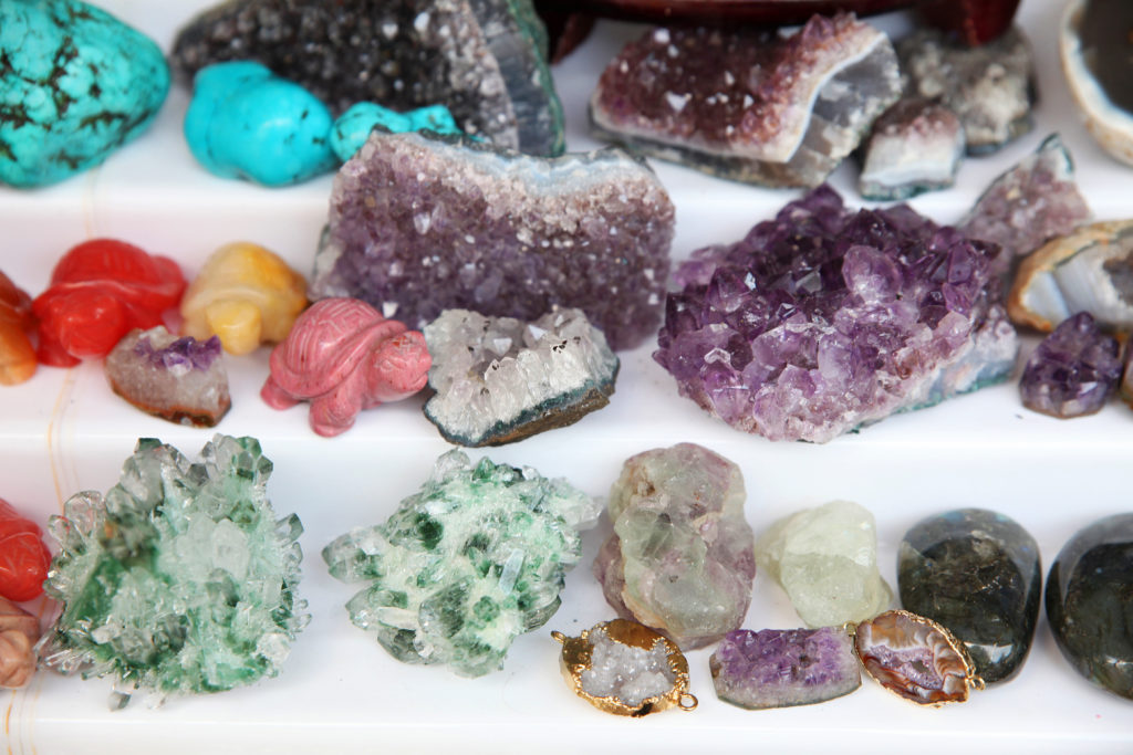 Display of various colorful gems and minerals